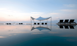 A mirrored view at Constance Moofushi, Maldives