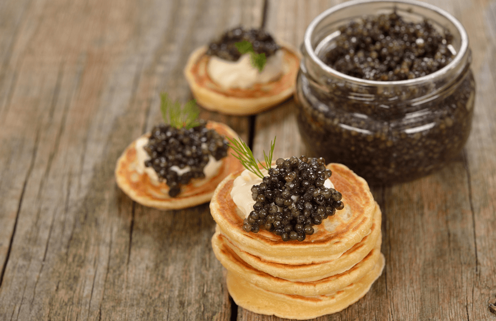 Luxury party food: caviar pancakes 